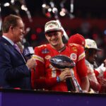 Feb 11, 2024; Paradise, Nevada, USA; Kansas City Chiefs quarterback Patrick Mahomes (15) celebrates with the Vince Lombardi Trophy after defeating the San Francisco 49ers in Super Bowl LVIII at Allegiant Stadium. Mandatory Credit: Mark J. Rebilas-USA TODAY Sports