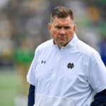 Notre Dame Fighting Irish Defensive Coordinator Al Golden watches warnups before the game against the Northern Illinois Huskies at Notre Dame Stadium.