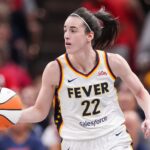 Indiana Fever guard Caitlin Clark (22) rushes up the court Friday, July 12, 2024, during the game at Gainbridge Fieldhouse in Indianapolis. The Indiana Fever defeated the Phoenix Mercury, 95-86.