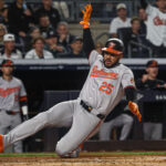 Sep 24, 2024; Bronx, New York, USA; Baltimore Orioles right fielder Anthony Santander (25) scores a run during the fourth inning against the New York Yankees at Yankee Stadium. Mandatory Credit: Vincent Carchietta-Imagn Images