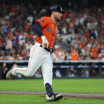 Oct 2, 2024; Houston, Texas, USA; Houston Astros third base Alex Bregman (2) runs after hitting a single against the Detroit Tigers during the second inning of game two of the Wildcard round for the 2024 MLB Playoffs at Minute Maid Park. Mandatory Credit: Thomas Shea-Imagn Images