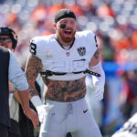 Oct 6, 2024; Denver, Colorado, USA; Las Vegas Raiders defensive end Maxx Crosby (98) before the game against the Denver Broncos at Empower Field at Mile High.