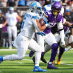 Oct 20, 2024; Minneapolis, Minnesota, USA; NFL; Detroit Lions running back David Montgomery (5) runs the ball against the Minnesota Vikings during the first quarter at U.S. Bank Stadium.