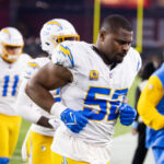 Oct 21, 2024; Glendale, Arizona, USA; Los Angeles Chargers linebacker Khalil Mack (52) against the Arizona Cardinals at State Farm Stadium. Mandatory Credit: Mark J. Rebilas-Imagn Images