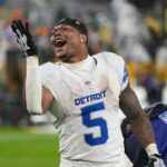 Nov 3, 2024; Green Bay, Wisconsin, USA; Detroit Lions running back David Montgomery (5) celebrates as he runs off the field following the game against the Green Bay Packers at Lambeau Field. Mandatory Credit: Jeff Hanisch-Imagn Images