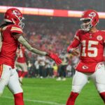 Nov 4, 2024; Kansas City, Missouri, USA; Kansas City Chiefs wide receiver DeAndre Hopkins (8) celebrates with quarterback Patrick Mahomes (15) after scoring against the Tampa Bay Buccaneers during the second half at GEHA Field at Arrowhead Stadium. Mandatory Credit: Denny Medley-Imagn Images