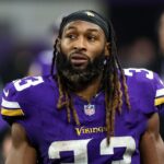 Dec 8, 2024; Minneapolis, Minnesota, USA; Minnesota Vikings running back Aaron Jones (33) looks on during the fourth quarter against the Atlanta Falcons at U.S. Bank Stadium. Mandatory Credit: Matt Krohn-Imagn Images