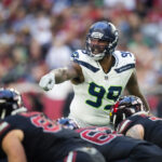 Dec 8, 2024; Glendale, Arizona, USA; Seattle Seahawks defensive end Leonard Williams (99) against the Arizona Cardinals at State Farm Stadium. Mandatory Credit: Mark J. Rebilas-Imagn Images