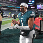 Dec 15, 2024; Philadelphia, Pennsylvania, USA; Philadelphia Eagles quarterback Jalen Hurts (1) runs off the field after win against the Pittsburgh Steelers Lincoln Financial Field.