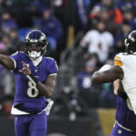 Dec 21, 2024; Baltimore, Maryland, USA; Lamar Jackson, Baltimore Ravens, throws as Pittsburgh Steelers defensive tackle Keeanu Benton (95) applies pressure during the first quarter at M&T Bank Stadium. Mandatory Credit: Tommy Gilligan-Imagn Images