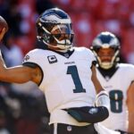 Dec 22, 2024; Landover, Maryland, USA; Philadelphia Eagles quarterback Jalen Hurts (1) warms up before the game against the Washington Commanders at Northwest Stadium. Mandatory Credit: Peter Casey-Imagn Images