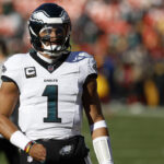 Dec 22, 2024; Landover, Maryland, USA; Philadelphia Eagles quarterback Jalen Hurts (1) stands on the field during warmup prior to the game against the Washington Commanders at Northwest Stadium.