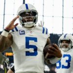 Indianapolis Colts quarterback Anthony Richardson (5) celebrates after rushing for a touchdown Sunday, Dec. 22, 2024, during a game against the Tennessee Titans at Lucas Oil Stadium in Indianapolis.