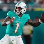 Dec 22, 2024; Miami Gardens, Florida, USA; Miami Dolphins quarterback Tua Tagovailoa (1) attempts a pass against the San Francisco 49ers during second half at Hard Rock Stadium.