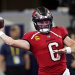 NFL Onde Assistir Dec 22, 2024; Arlington, Texas, USA; Tampa Bay Buccaneers quarterback Baker Mayfield (6) throws a pass before the game against the Dallas Cowboys at AT&T Stadium.