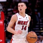 Dec 29, 2024; Houston, Texas, USA; Miami Heat guard Tyler Herro (14) handles the ball against the Houston Rockets during the third quarter at Toyota Center.