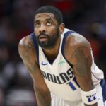 Jan 1, 2025; Houston, Texas, USA; Dallas Mavericks guard Kyrie Irving (11) looks up during the fourth quarter against the Houston Rockets at Toyota Center.
