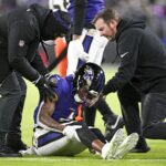 Jan 4, 2025; Baltimore, Maryland, USA; Baltimore Ravens wide receiver Zay Flowers (4) reacts after a tackle during the first quarter against the Cleveland Browns at M&T Bank Stadium. Mandatory Credit: Tommy Gilligan-Imagn Images
