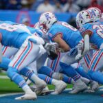 Tennessee Titans quarterback Will Levis (8) fumbles the ball against the Houston Texans during the third quarter at Nissan Stadium in Nashville, Tenn., Sunday, Jan. 5, 2025.