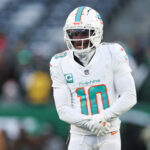 Jan 5, 2025; East Rutherford, New Jersey, USA; Miami Dolphins wide receiver Tyreek Hill (10) on the field before the game against the New York Jets at MetLife Stadium. Mandatory Credit: Vincent Carchietta-Imagn Images