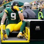 Green Bay Packers wide receiver Christian Watson (9) leaves the field on a cart after getting injured against the Chicago Bears in the second quarter during their football game Sunday, January 5, 2025, at Lambeau Field in Green Bay, Wisconsin.