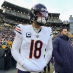 Jan 5, 2025; Green Bay, Wisconsin, USA; Chicago Bears quarterback Caleb Williams (18) prior to the game against the Green Bay Packers at Lambeau Field. Mandatory Credit: Jeff Hanisch-Imagn Images