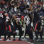 Jan 11, 2025; Houston, Texas, USA; Houston Texans wide receiver Nico Collins (12) celebrates a touchdown against the Los Angeles Chargers in the second quarter in an AFC wild card game at NRG Stadium. Mandatory Credit: Thomas Shea-Imagn Images