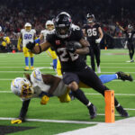 Jan 11, 2025; Houston, Texas, USA; Houston Texans running back Joe Mixon (28) scores a touchdown against the Los Angeles Chargers in the fourth quarter in an AFC wild card game at NRG Stadium. Mandatory Credit: Thomas Shea-Imagn Images