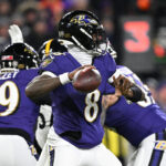 Jan 11, 2025; Baltimore, Maryland, USA; Baltimore Ravens quarterback Lamar Jackson (8) passes in the second quarter against the Pittsburgh Steelers in a NFL AFC wild card game at M&T Bank Stadium. Mandatory Credit: Tommy Gilligan-Imagn Images