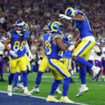 Jan 13, 2025; Glendale, AZ, USA; Los Angeles Rams running back Kyren Williams (23) reacts after making a touchdown catch against the Minnesota Vikings during the first half in an NFC wild card game at State Farm Stadium. Mandatory