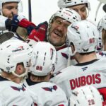 Jan 16, 2025; Ottawa, Ontario, CAN; Washington Capitals left wing Alex Ovechkin (8) celebrates with team after scoring a goal in overtime against the Ottawa Senators at the Canadian Tire Centre. Mandatory Credit: Marc DesRosiers-Imagn Images