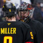 Jan 18, 2025; Vancouver, British Columbia, CAN; Vancouver Canucks forward J.T. Miller (9) and goalie Thatcher Demko (35) talk during a stop in play against the Edmonton Oilers in the third period at Rogers Arena. Mandatory Credit: Bob Frid-Imagn Images