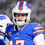 Syndication: Democrat and Chronicle. Buffalo Bills quarterback Josh Allen warms up before the Buffalo Bills divisional game against the Baltimore Ravens at Highmark Stadium in Orchard Park on Jan. 19, 2025.