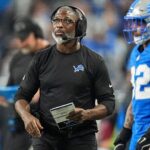 Detroit Lions defensive coordinator Aaron Glenn watches a replay during the first half of the 45-31 loss to the Washington Commanders in the NFC divisional round of the NFL playoffs at Ford Field in Detroit on Saturday, Jan. 18, 2025. - Jets