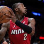 Jan 21, 2025; Miami, Florida, USA; Miami Heat guard Terry Rozier (2) protects the basketball against the Portland Trail Blazers during the first quarter at Kaseya Center. Mandatory Credit: Sam Navarro-Imagn Images