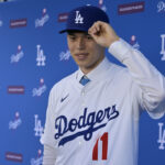 Jan 22, 2025; Los Angeles, CA, USA; Los Angeles Dodgers pitcher Roki Sasaki (11) during an introductory press conference at Dodger Stadium. Mandatory Credit: Jayne Kamin-Oncea-Imagn Images