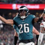 Jan 26, 2025; Philadelphia, PA, USA; Philadelphia Eagles running back Saquon Barkley (26) celebrates after a touchdown against the Washington Commanders during the second half in the NFC Championship game at Lincoln Financial Field. Mandatory Credit: Bill Streicher-Imagn Images