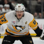 Jan 27, 2025; San Jose, California, USA; Pittsburgh Penguins center Sidney Crosby (87) waits for a faceoff against the San Jose Sharks in the third period at SAP Center at San Jose. Mandatory Credit: David Gonzales-Imagn Images