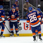 Jan 28, 2025; Elmont, New York, USA; New York Islanders center Bo Horvat (14) celebrates his goal against the Colorado Avalanche with defenseman Adam Pelech (3) and center Mathew Barzal (13) and defenseman Scott Perunovich (26) during the third period at UBS Arena. Mandatory Credit: Brad Penner-Imagn Images