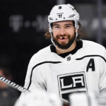 Jan 1, 2019; Las Vegas, NV, USA; Los Angeles Kings defenseman Drew Doughty (8) smiles before a second period face off against the Vegas Golden Knights at T-Mobile Arena. Mandatory Credit: Stephen R. Sylvanie-USA TODAY Sports
