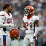 LAS VEGAS, NEVADA - FEBRUARY 06: Myles Garrett #95 and Denzel Ward #21 of the Cleveland Browns and AFC look on during the first half of the 2022 NFL Pro Bowl against the NFC at Allegiant Stadium on February 06, 2022 in Las Vegas, Nevada. (Photo by Christian Petersen/Getty Images)