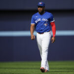 TORONTO, ON - SEPTEMBER 29: Vladimir Guerrero Jr. #27 of Toronto Blue Jays walks on the field before playing the Miami Marlins in their MLB game at the Rogers Centre on September 29, 2024 in Toronto, Ontario, Canada. (Photo by Mark Blinch/Getty Images)