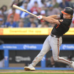 MINNEAPOLIS, MN - SEPTEMBER 28: Baltimore Orioles infielder Jackson Holliday (7) makes contact during a MLB game between the Minnesota Twins and Baltimore Orioles on September 28, 2024, at Target Field in Minneapolis, MN. (Photo by Nick Wosika/Icon Sportswire via Getty Images)