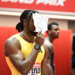 BOSTON, MA - FEBRUARY 02: Noah Lyles of the United States holds a sign "Tyreek could never" after winning the men's 60m in the New Balance Indoor Grand Prix on February 2, 2025, at the TRACK at new balance in Boston, MA. Lyles won with a time of 6.52. (Photo by Erica Denhoff/Icon Sportswire via Getty Images)