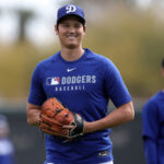 GLENDALE, ARIZONA - FEBRUARY 11: Shohei Ohtani #17 of the Los Angeles Dodgers smiles during workouts at Camelback Ranch on February 11, 2025 in Glendale, Arizona. (Photo by Chris Coduto/Getty Images)