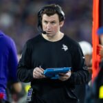 Minnesota Vikings assistant quarterbacks coach Grant Udinski against the Los Angeles Rams during an NFC wild card game at State Farm Stadium.