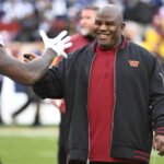 Jan 7, 2024; Landover, Maryland, USA; Washington Commanders offensive coordinator Eric Bieniemy on the field before the game against the Dallas Cowboys at FedExField. Mandatory Credit: Brad Mills-USA TODAY Sports