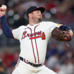 Aug 1, 2024; Atlanta, Georgia, USA; Atlanta Braves relief pitcher Luke Jackson (22) throws against the Miami Marlins in the seventh inning at Truist Park. Mandatory Credit: Brett Davis-USA TODAY Sports