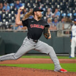 Sep 3, 2024; Kansas City, Missouri, USA; Cleveland Guardians pitcher Scott Barlow (58) delivers a pitch against the Kansas City Royals in the ninth inning at Kauffman Stadium. Mandatory Credit: Denny Medley-Imagn Images
