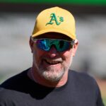 Sep 7, 2024; Oakland, California, USA; Oakland Athletics manager Mark Kotsay (7) smiles during warmups before the game between the Detroit Tigers and the Oakland Athletics at Oakland-Alameda County Coliseum. Mandatory Credit: Robert Edwards-Imagn Images
